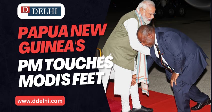 Papua New Guinea's PM touches Modi's feet